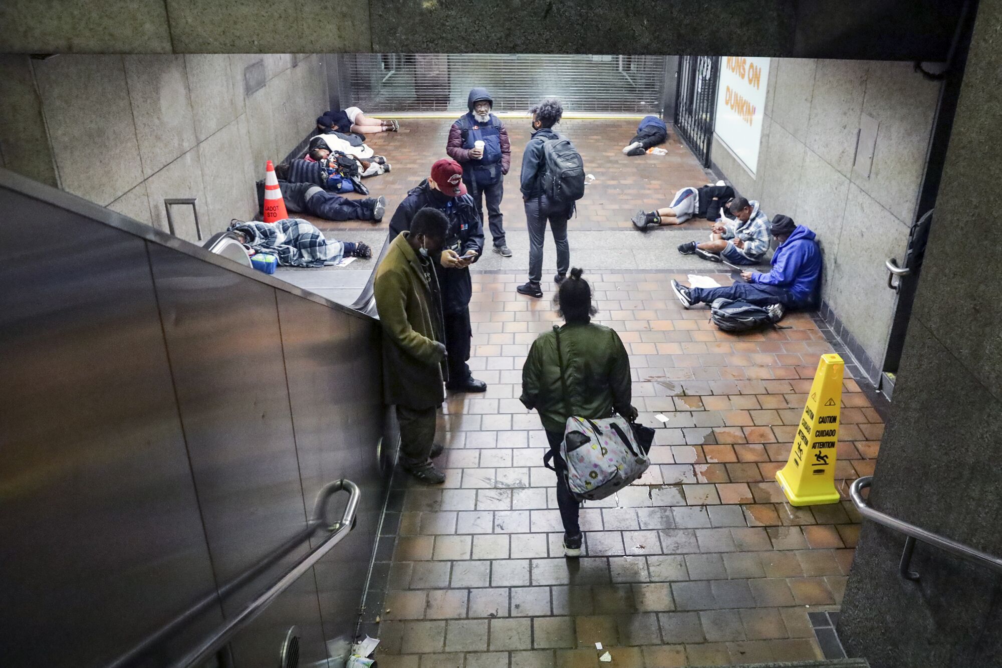 Workers check on the welfare of homeless people