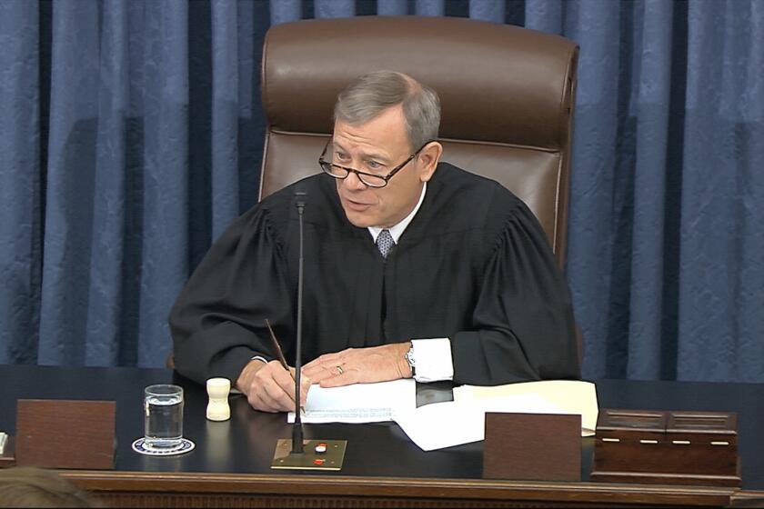 In this image from video, presiding officer Supreme Court Chief Justice John Roberts speaks during the impeachment trial against President Donald Trump in the Senate at the U.S. Capitol in Washington, Wednesday, Jan. 22, 2020. (Senate Television via AP)