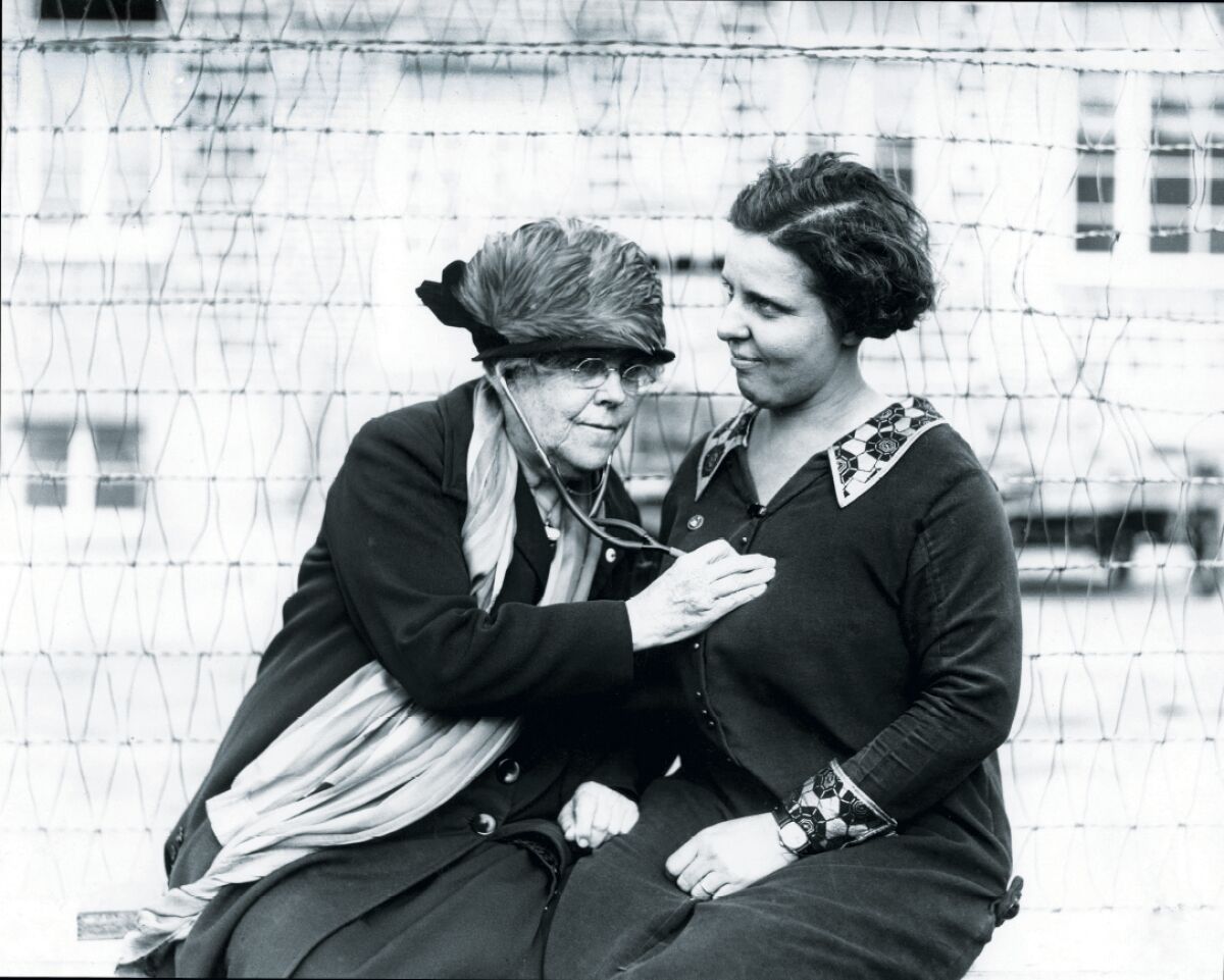 Dr. Charlotte Baker uses a stethoscope on Mrs. R.M. Moran on Dec. 18, 1925.
