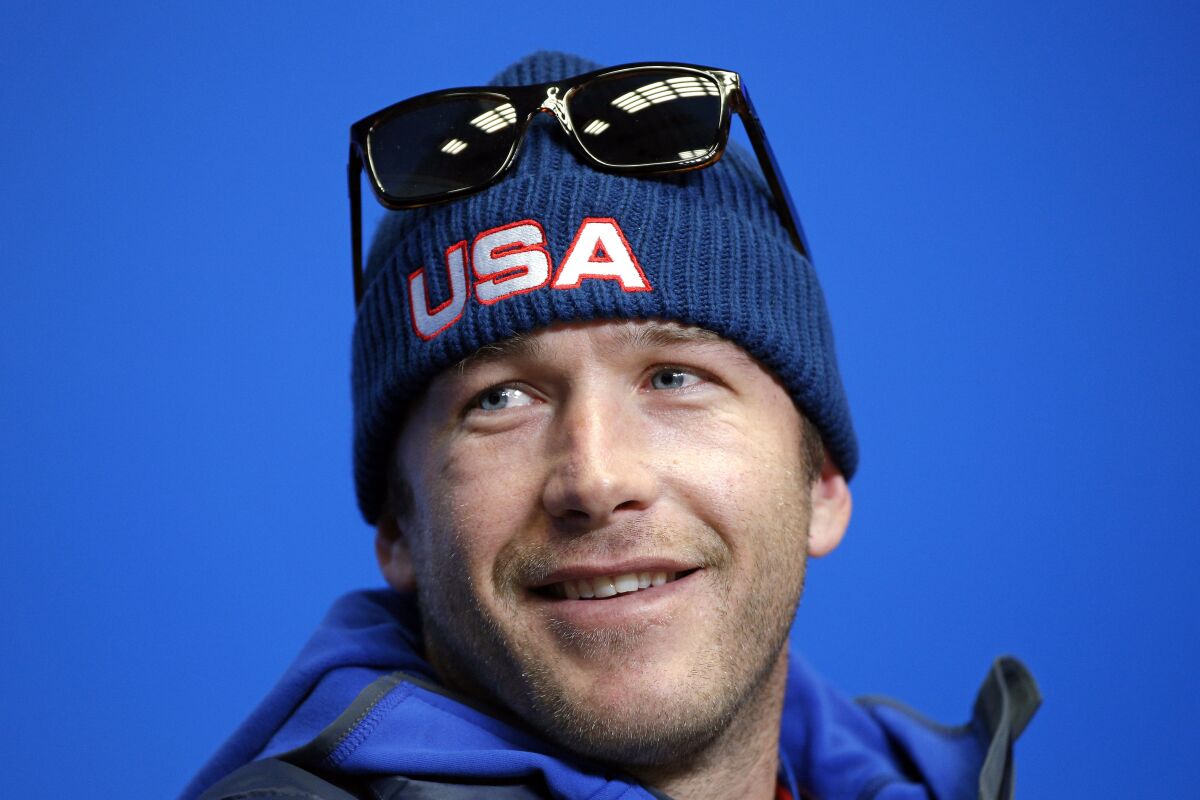 FILE - This Feb. 6, 2014, file photo shows Bode Miller during the U.S. ski team's news conference at the Gorki media center at the Sochi 2014 Winter Olympics in Krasnaya Polyana, Russia. Olympic ski racing champion Bode Miller is launching a winter sports academy to help produce the next wave of standouts on the snow. Miller’s partnering with the Institute for Civic Leadership Academy to open an online learning program geared toward students in grades 7-12. (AP Photo/Christophe Ena, File)