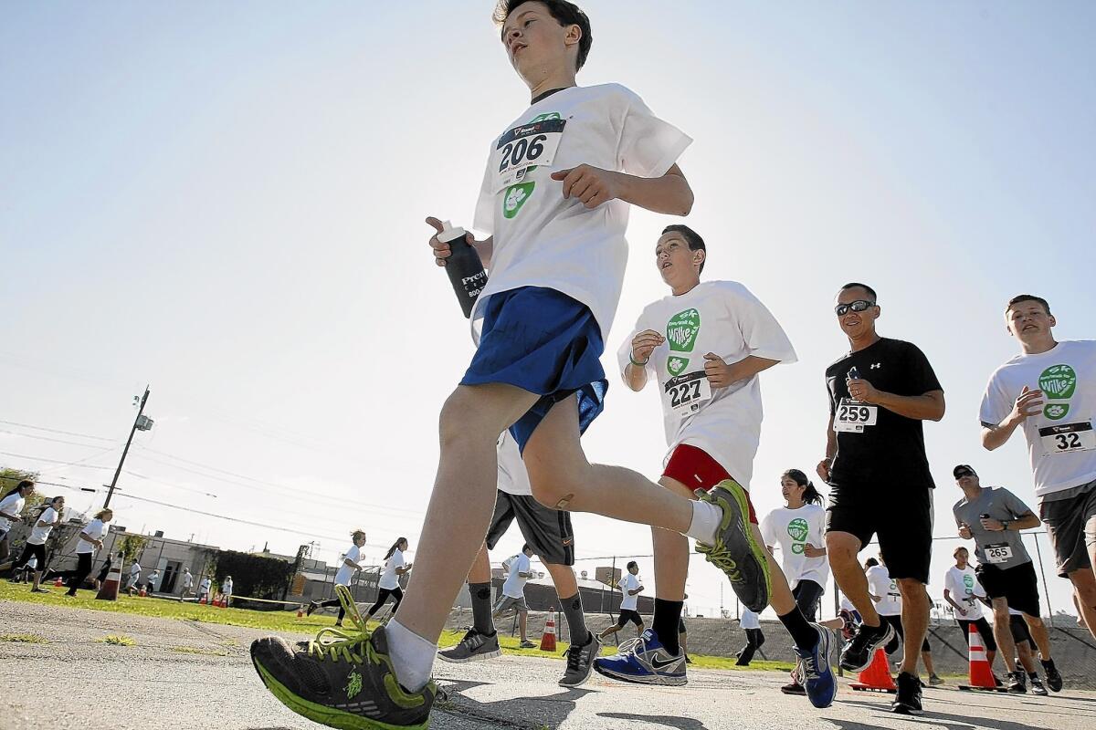 Jordan Middle School held a 5K walk/run in honor of student Christopher Wilke, a 12-year-old Burbank boy who died last month from a rare bile duct cancer, at the Burbank school on Saturday, April 5, 2014. Proceeds benefit the Talbert Foundation.