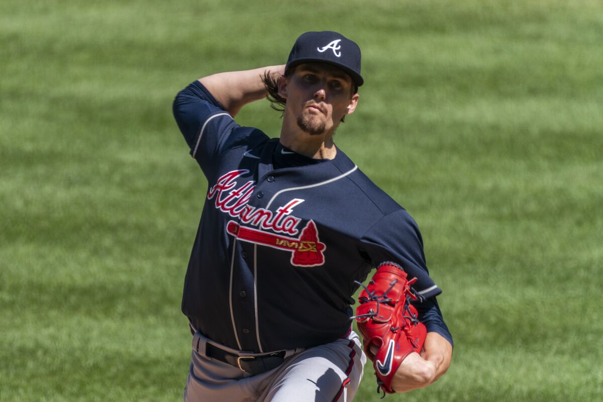 Atlanta Braves starting pitcher Kyle Wright throws during the first inning of a baseball game against the Washington Nationals in Washington, Sunday, Sept. 13, 2020. (AP Photo/Manuel Balce Ceneta)