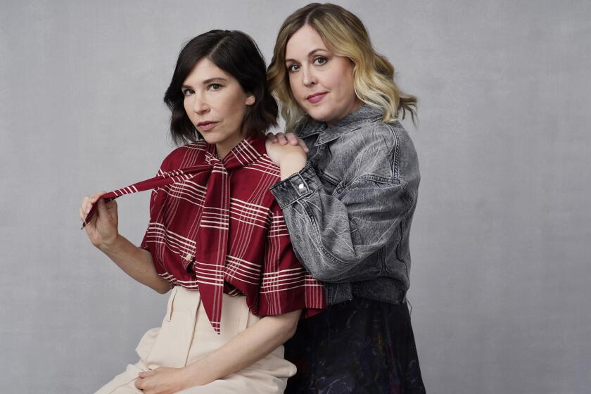 Carrie Brownstein, left, and Corin Tucker of the band Sleater-Kinney pose for a portrait in Los Angeles on Monday, Sept. 25, 2023, to promote their album "Little Rope." (AP Photo/Chris Pizzello)
