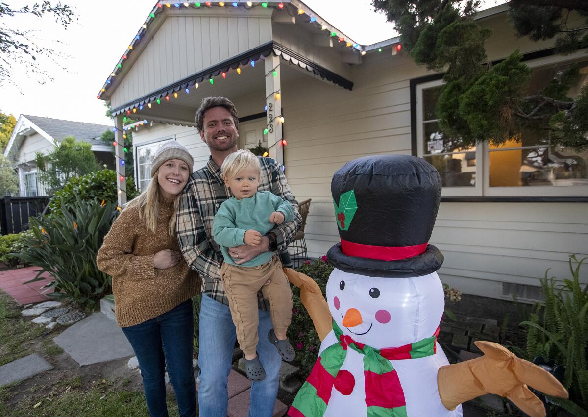 Alli, Bobby, and Jude Talley at their Costa Mesa home on Friday, Dec 3.