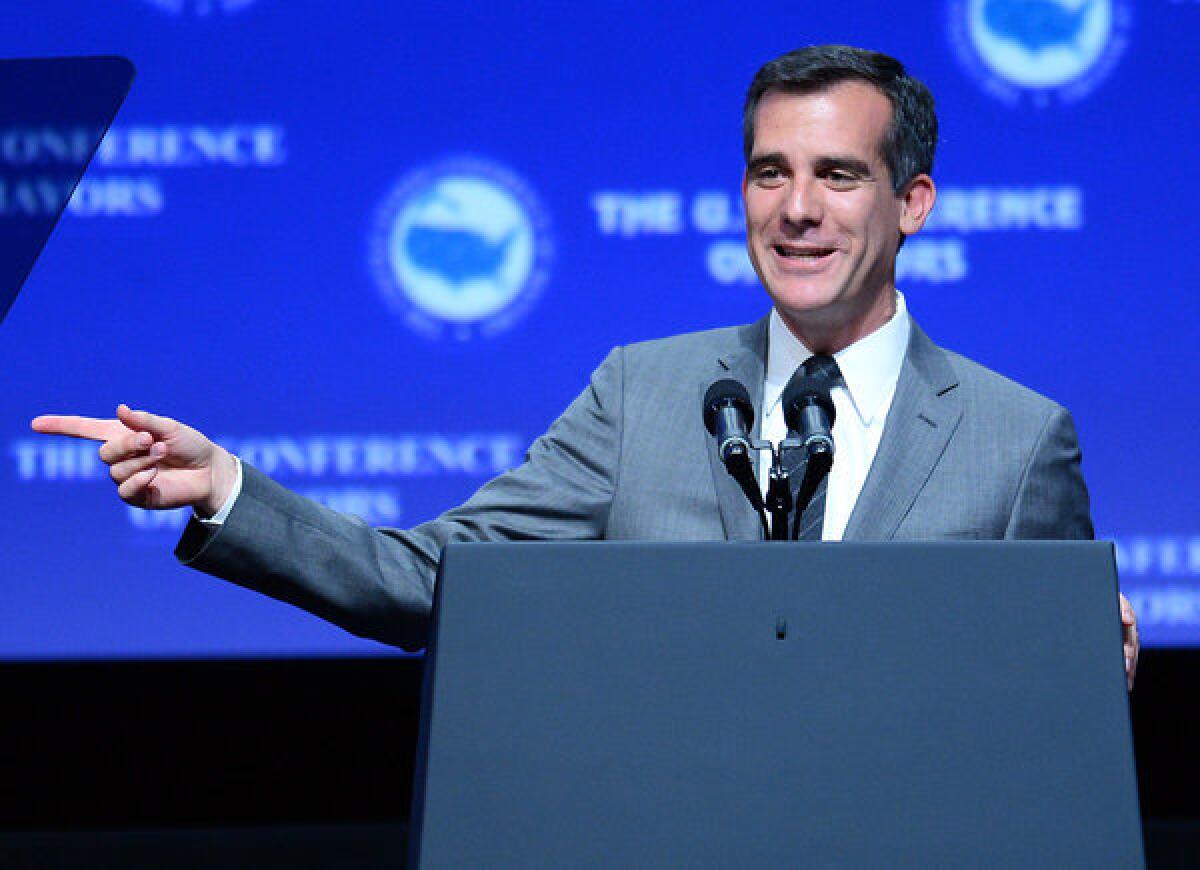 Los Angeles Mayor-elect Eric Garcetti speaks at the 81st annual U.S. Conference of Mayors at the Mandalay Bay Convention Center on June 21 in Las Vegas. His inaugural party will be Sunday.