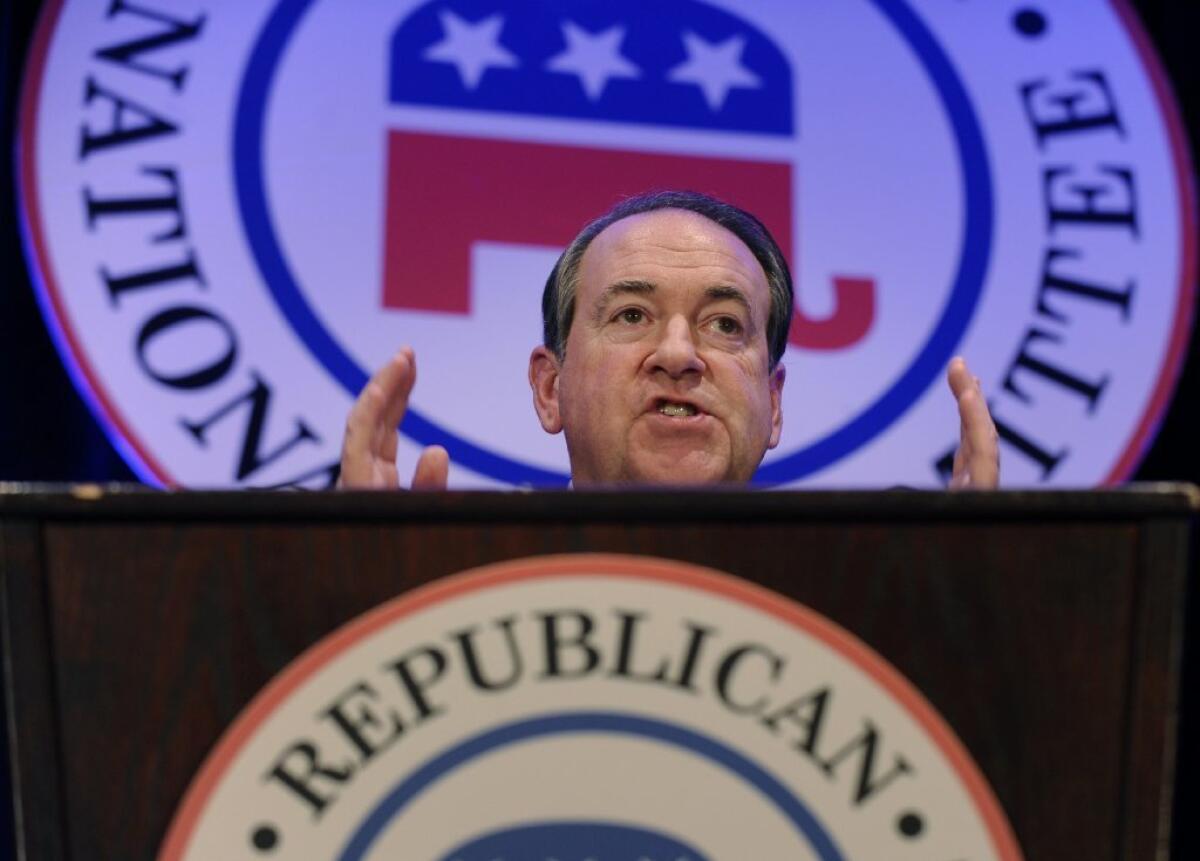 Mike Huckabee speaks at the Republican National Committee winter meeting in Washington on Thursday.