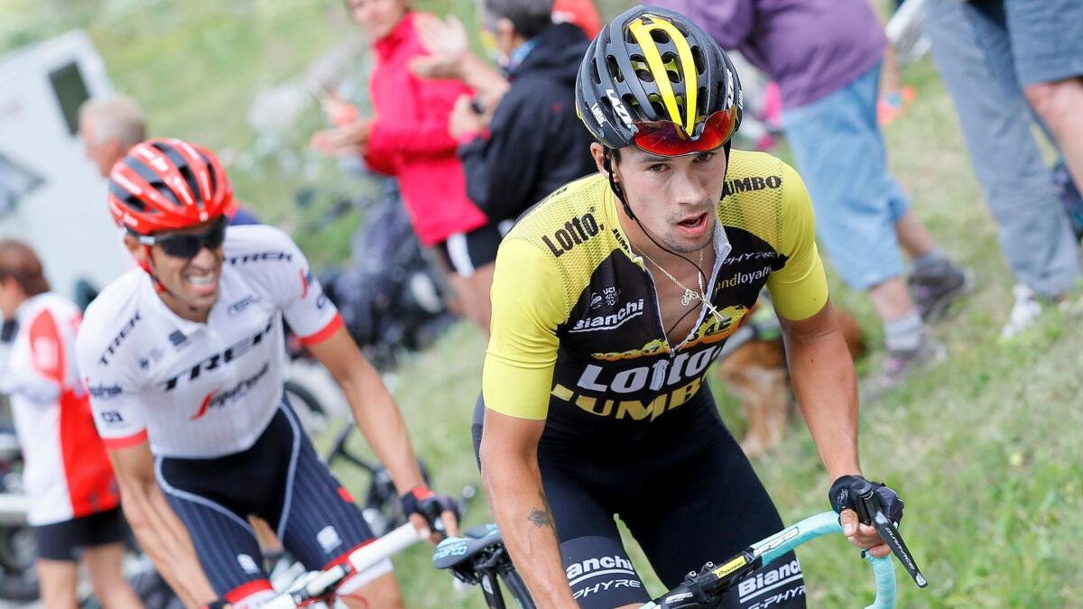 Primoz Roglic, right, competes during Stage 17 of the Tour de France on July 19.