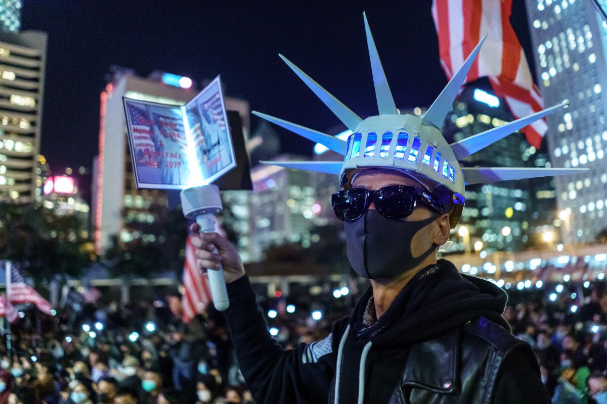 Pro-democracy demonstrators gather for a Thanksgiving rally