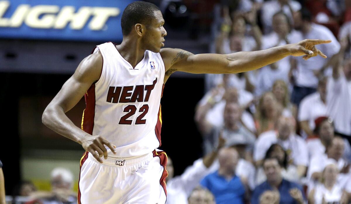 Heat forward James Jones (22) acknowledges a teammate after making a three-point shot during a playoff game against the Bobcats last month.