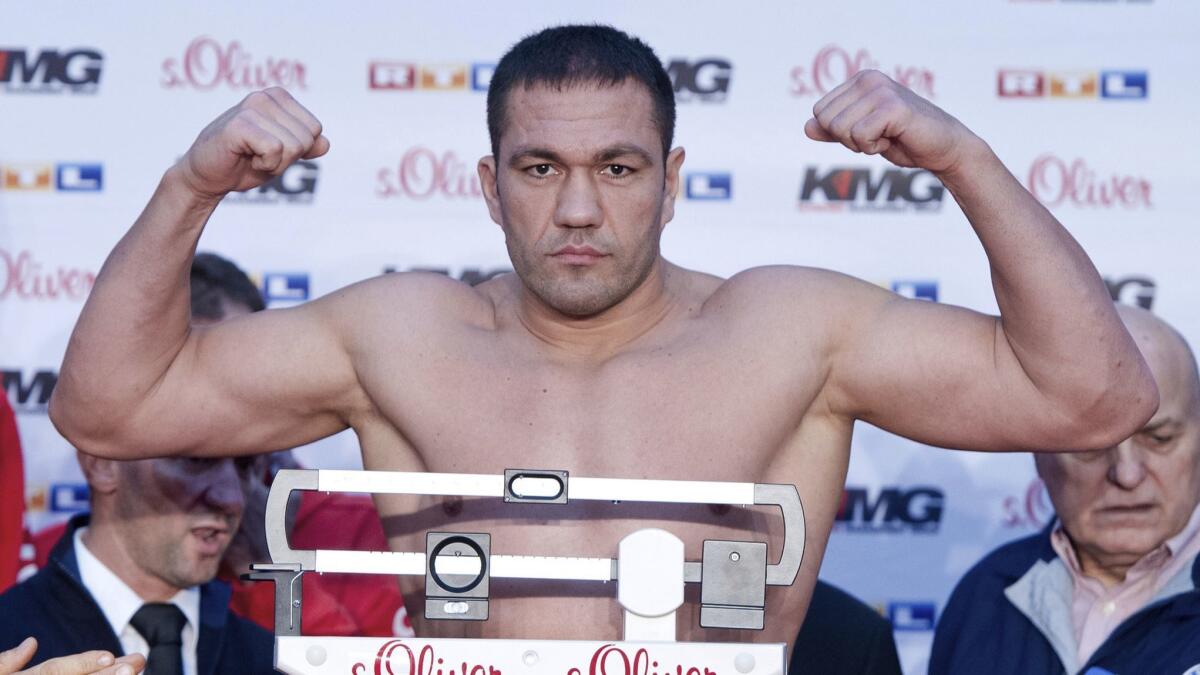 Boxer Kubrat Pulev weighs in for his fight against Wladimir Klitschko in Hamburg, Germany on Nov. 14, 2014.