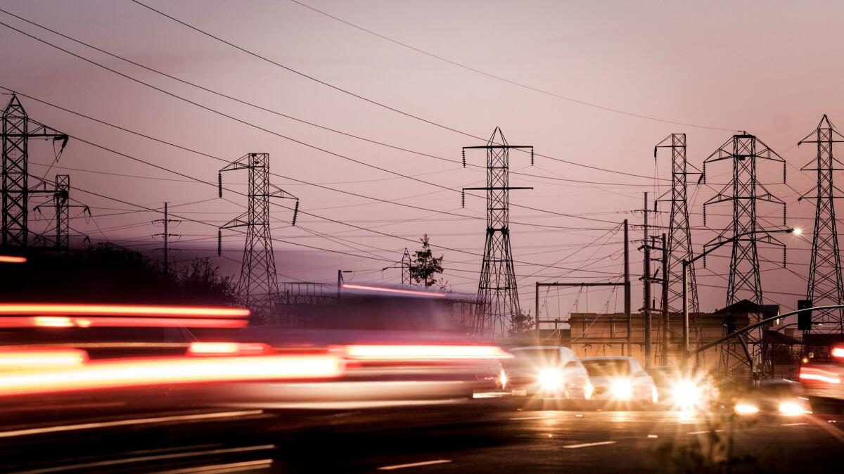 Power lines run near Highway 50 on the east side of Sacramento.