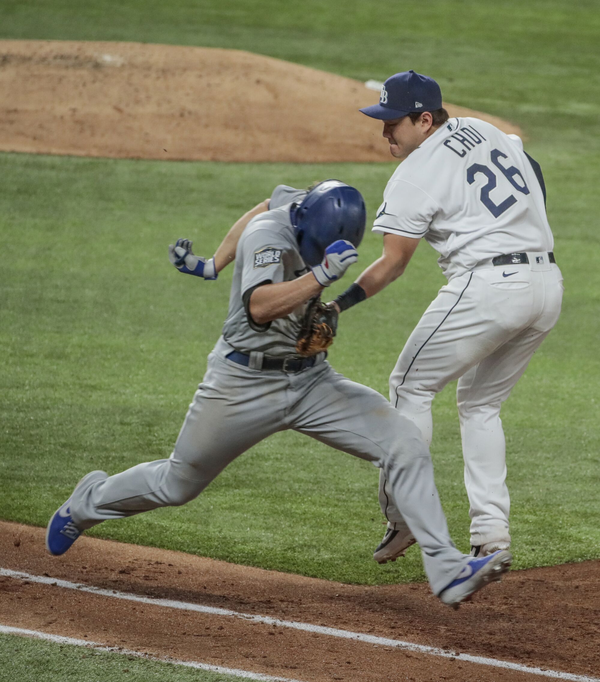 Corey Seager is tagged out by Ji-Man Choi.