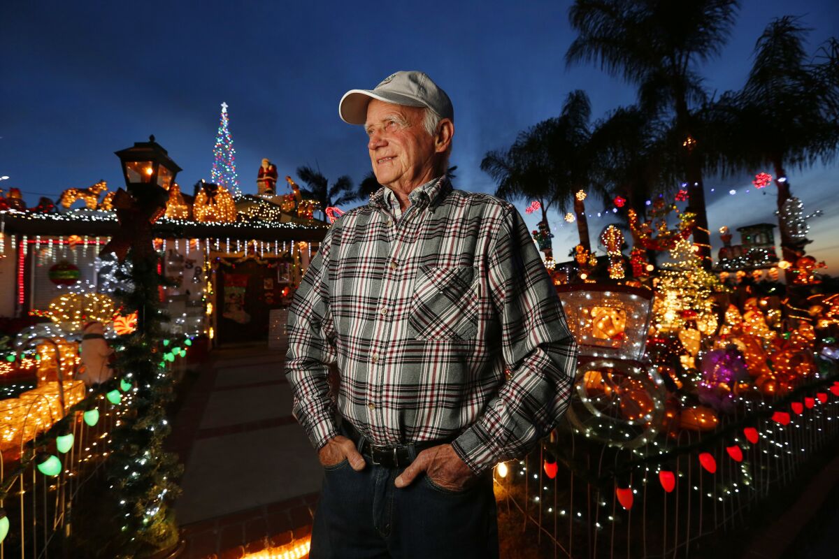 Bill Gilfillen stands in front of his Christmas on Knob Hill holiday display in San Marcos in 2017. 