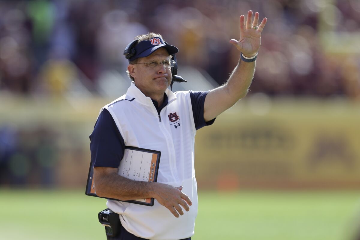 Auburn coach Gus Malzahn directs his team during the Outback Bowl 