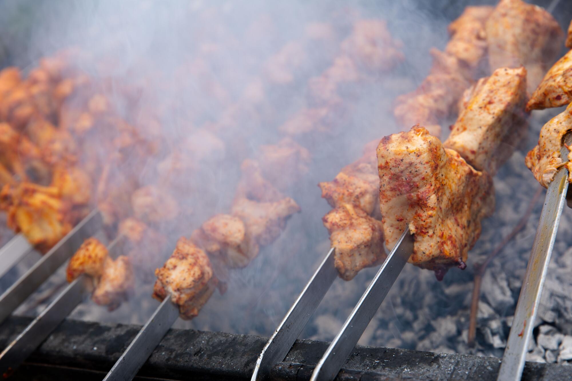 Skewered meat on the grill