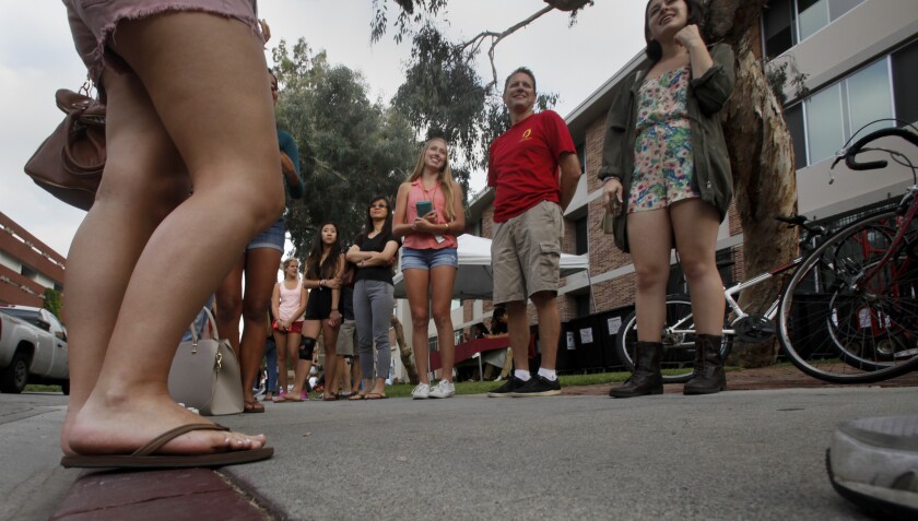 Incoming freshmen and their families in front of Von Kleinsmid Residence Hall during USC's annual move-in day in August.