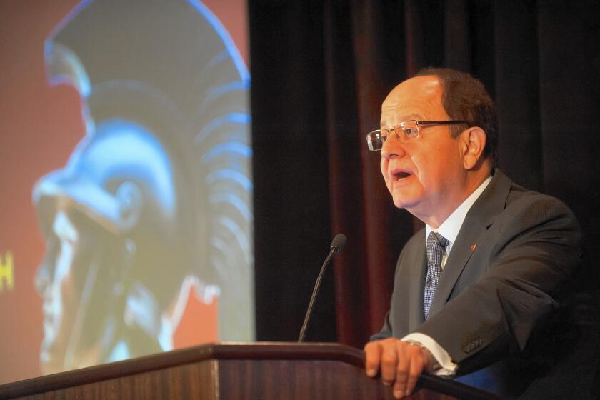 USC President C. L. Max Nikias addresses a crowd of alumni on a 2015 fundraising trip to Austin, Texas.