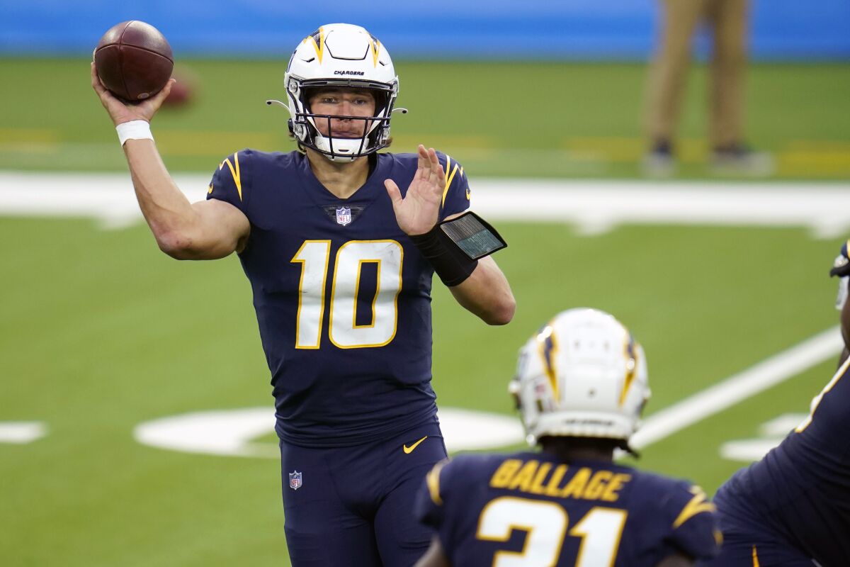 Chargers rookie quarterback Justin Herbert throws a pass.