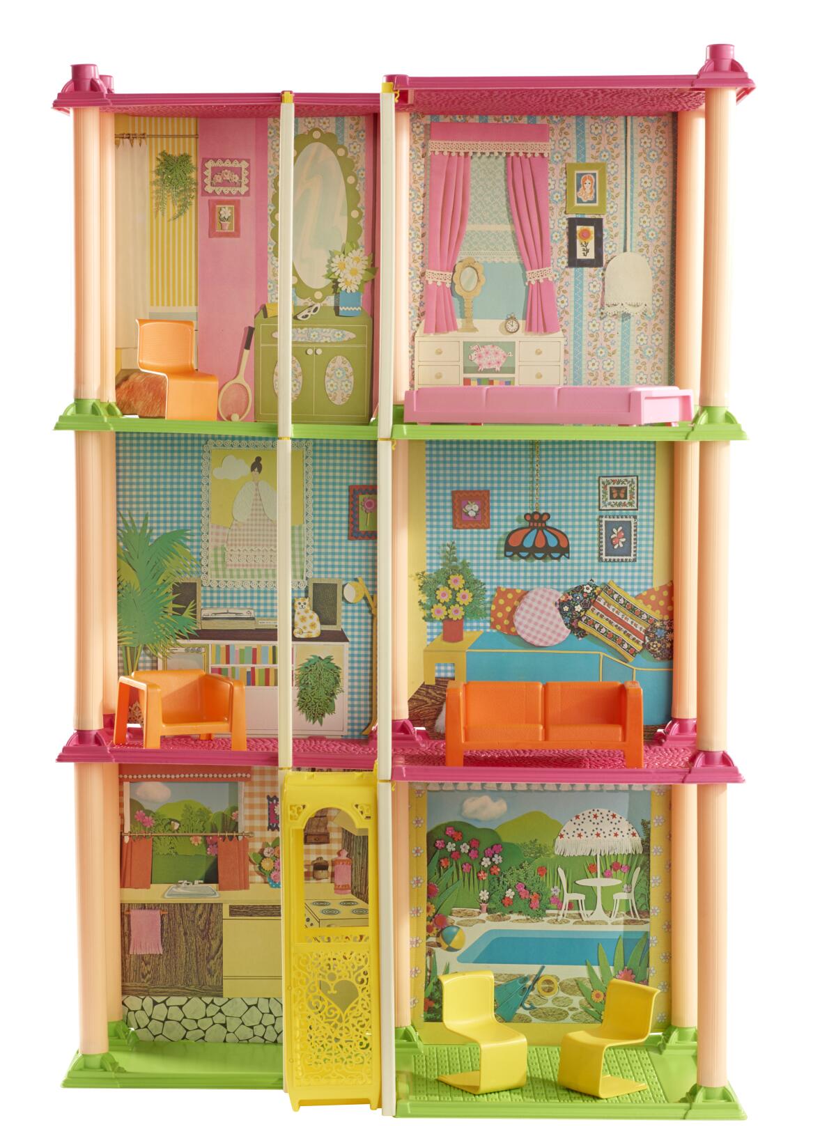 A dollhouse made from cardboard and plastic takes the form of a three-story townhouse decorated in '70s-era craft styles