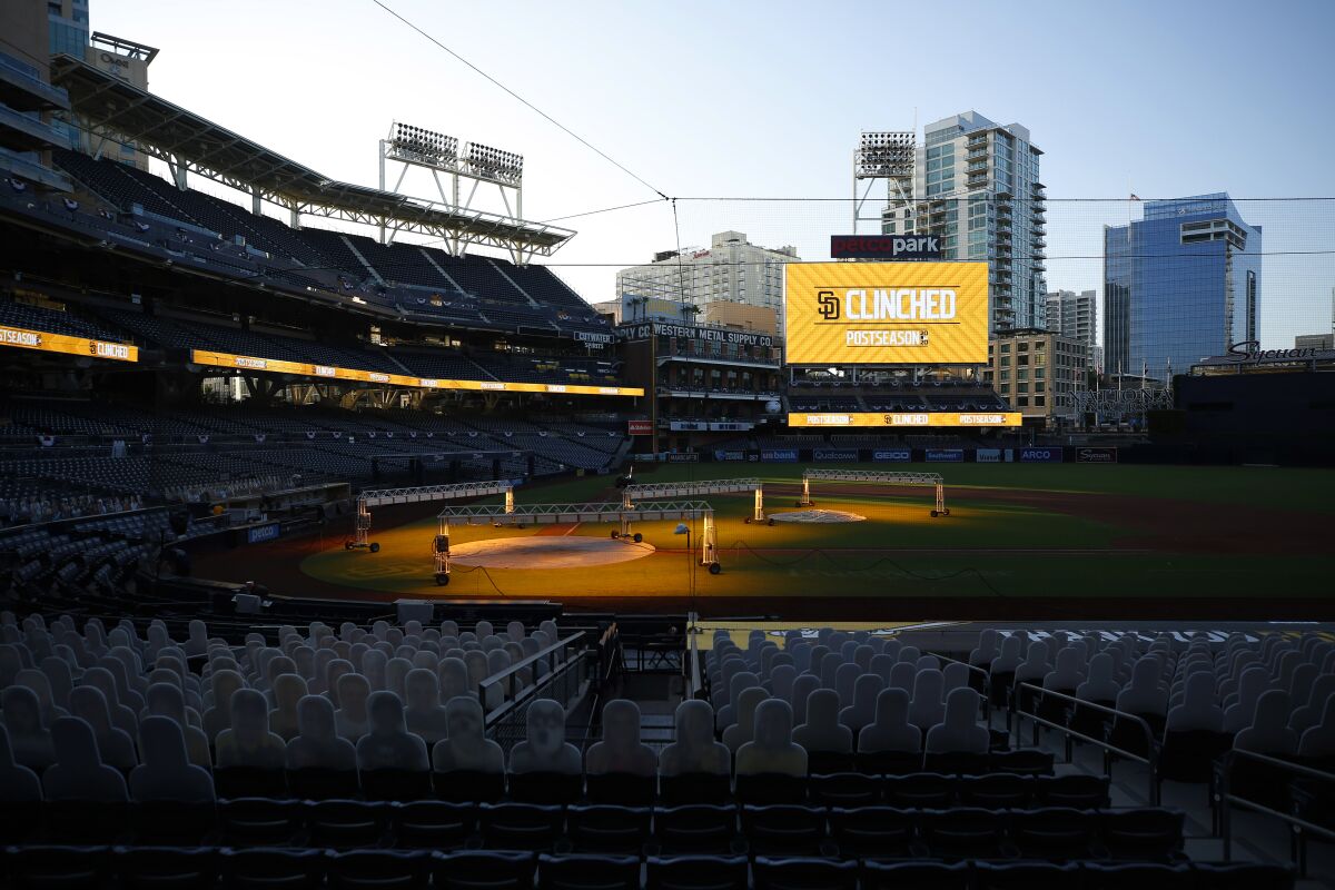 Scoreboard tells the story after Padres clinched playoff berth Sunday at Petco Park.