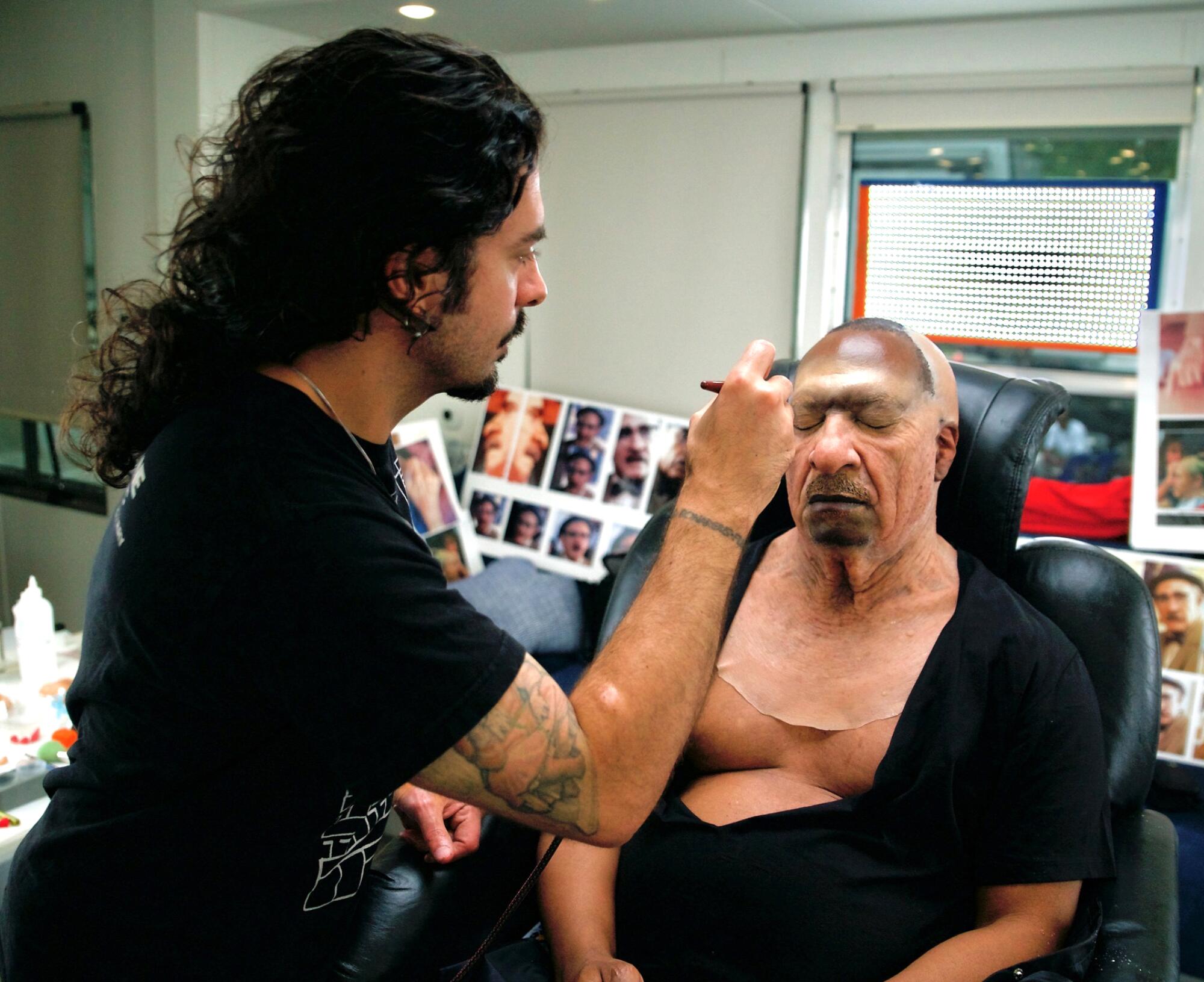 Process shot of Eddie Murphy transforming into a character for the film "Coming 2 America."  