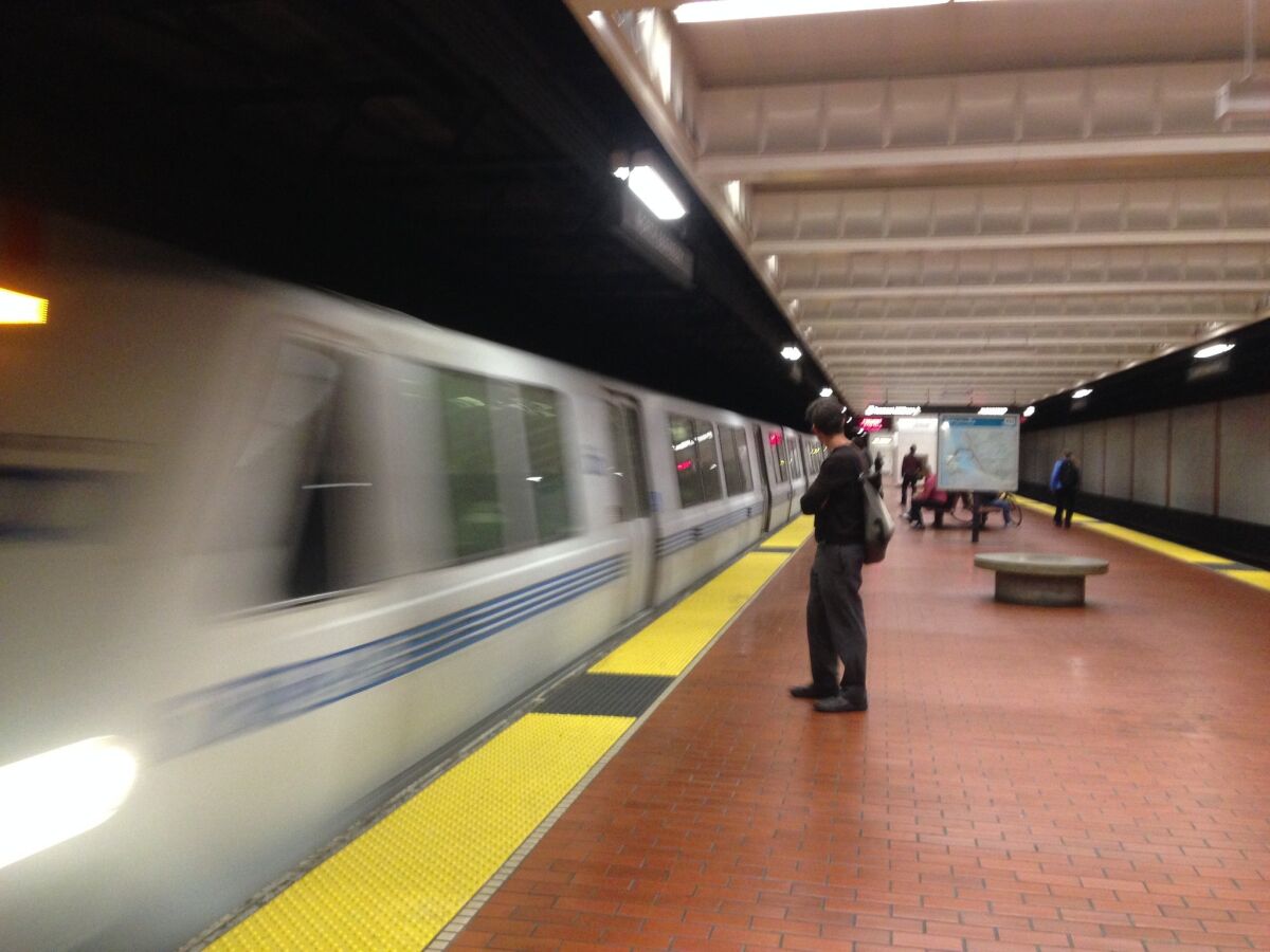 A BART commuter train entering Berkeley station.