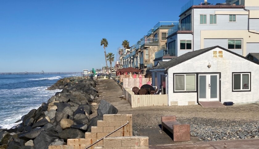 Property owners hope to repair this rock revetment that protects homes along South Pacific Street in Oceanside.