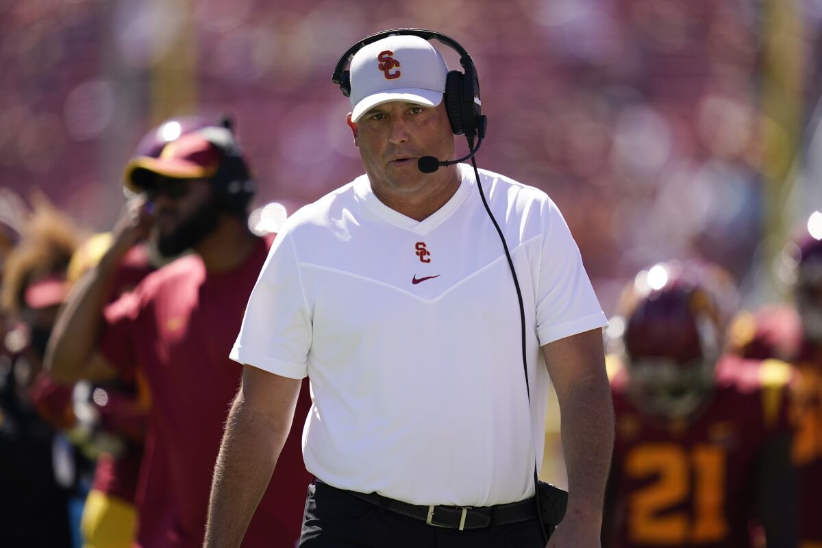 Southern California head coach Clay Helton walks on the sideline during an NCAA college football game against San Jose State Saturday, Sept. 4, 2021, in Los Angeles. (AP Photo/Ashley Landis)