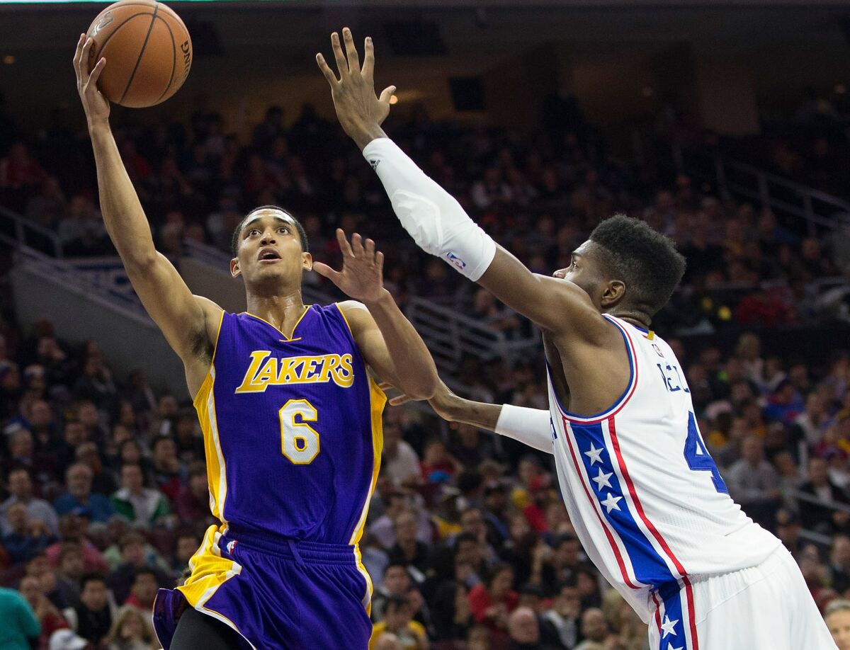 Lakers guard Jordan Clarkson attempts a shot over 76ers forward Nerlens Noel during a game on Dec. 1.