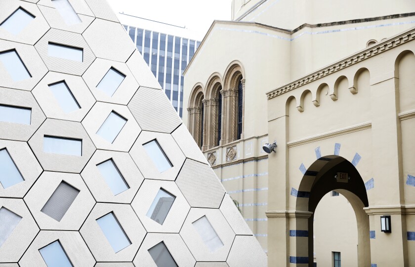 A piece of the slanted Audrey Irmas Pavilion is seen before the Byzantine-style Wilshire Boulevard Temple sanctuary