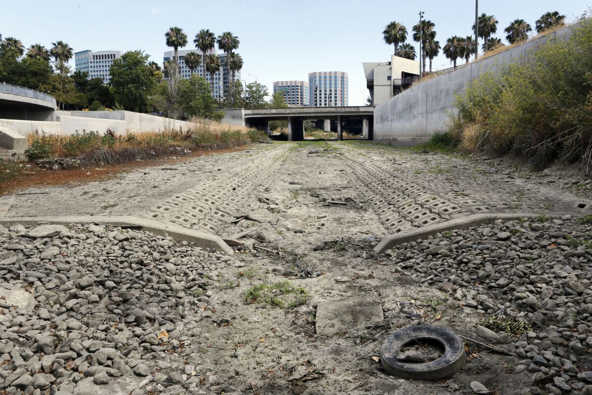 The dried up Guadalupe River near Santa Clara Street in San Jose, Calif., on July 17.