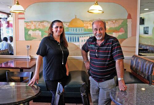 Suzan Hassan is floor manager and Abu Ahmad owner of the 5-year-old Olive Tree Restaurant in Anaheim, which alongside familiar Middle Eastern dishes also serves regional recipes of Jordan, Syria and elsewhere.