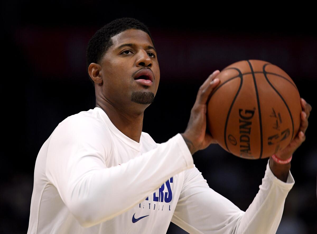 Clippers forward Paul George works on his shot before a game earlier this season.