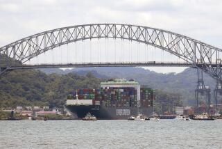 A cargo ship sails toward the Pacific Ocean after passing though the Panama Canal, seen from Panama City, Friday, Aug. 25, 2023. Due to a lack of rainfall, authorities in early August limited the number of ships passing through. (AP Photo/Agustin Herrera)