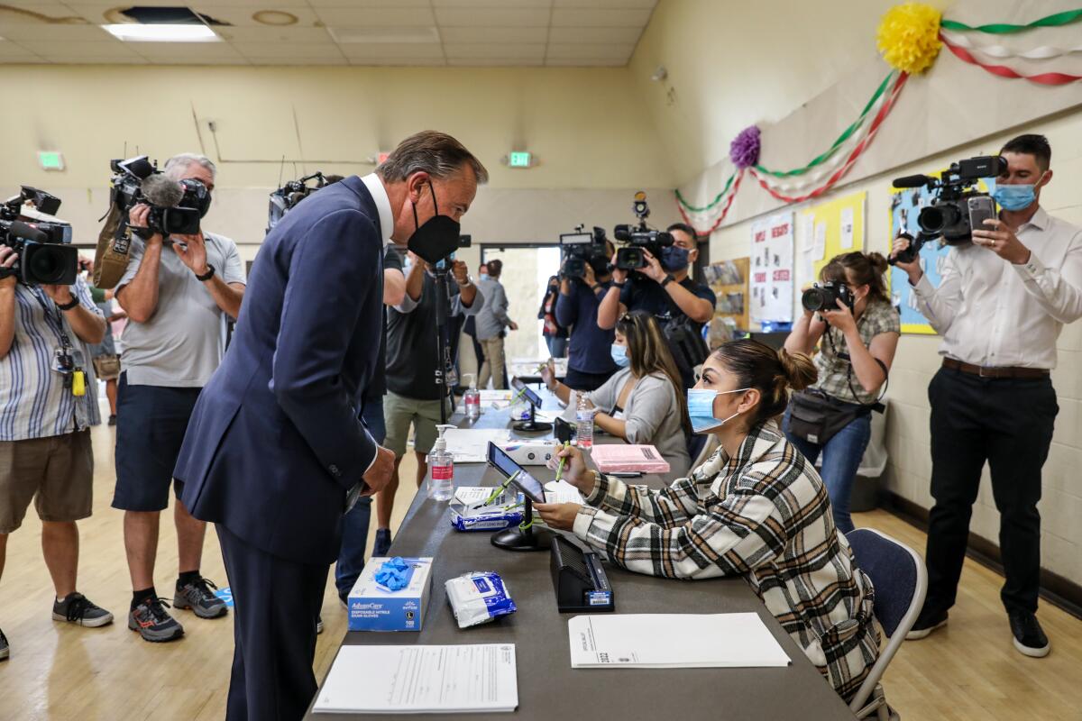  Rick Caruso cast his ballot at the Boyle Heights Senior Citizen Center on Tuesday.