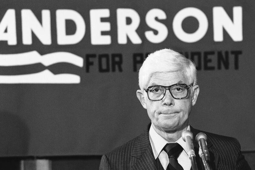 FILE - In this July 2, 1980 file photo, Independent presidential candidate Rep. John Anderson of Illinois ponders a question from reporters during a press conference in Washington. The former Illinois congressman and presidential candidate has died. A family statement says the 95-year-old Rockford Republican died Sunday, Dec. 3, 2017, in Washington, D.C. Anderson served ten terms in the U.S. House of Representatives and sought the Republican presidential nomination in 1980. He later waged an independent campaign against Democratic President Jimmy Carter and GOP challenger Ronald Reagan. Anderson received 7 percent of the national vote.(AP Photo/Ira Schwarz)