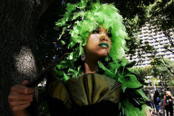 Drag Queen poses for a photograph in Hyde Park prior to the start of the annual Sydney Gay and Lesbian Mardi Gras Parade.