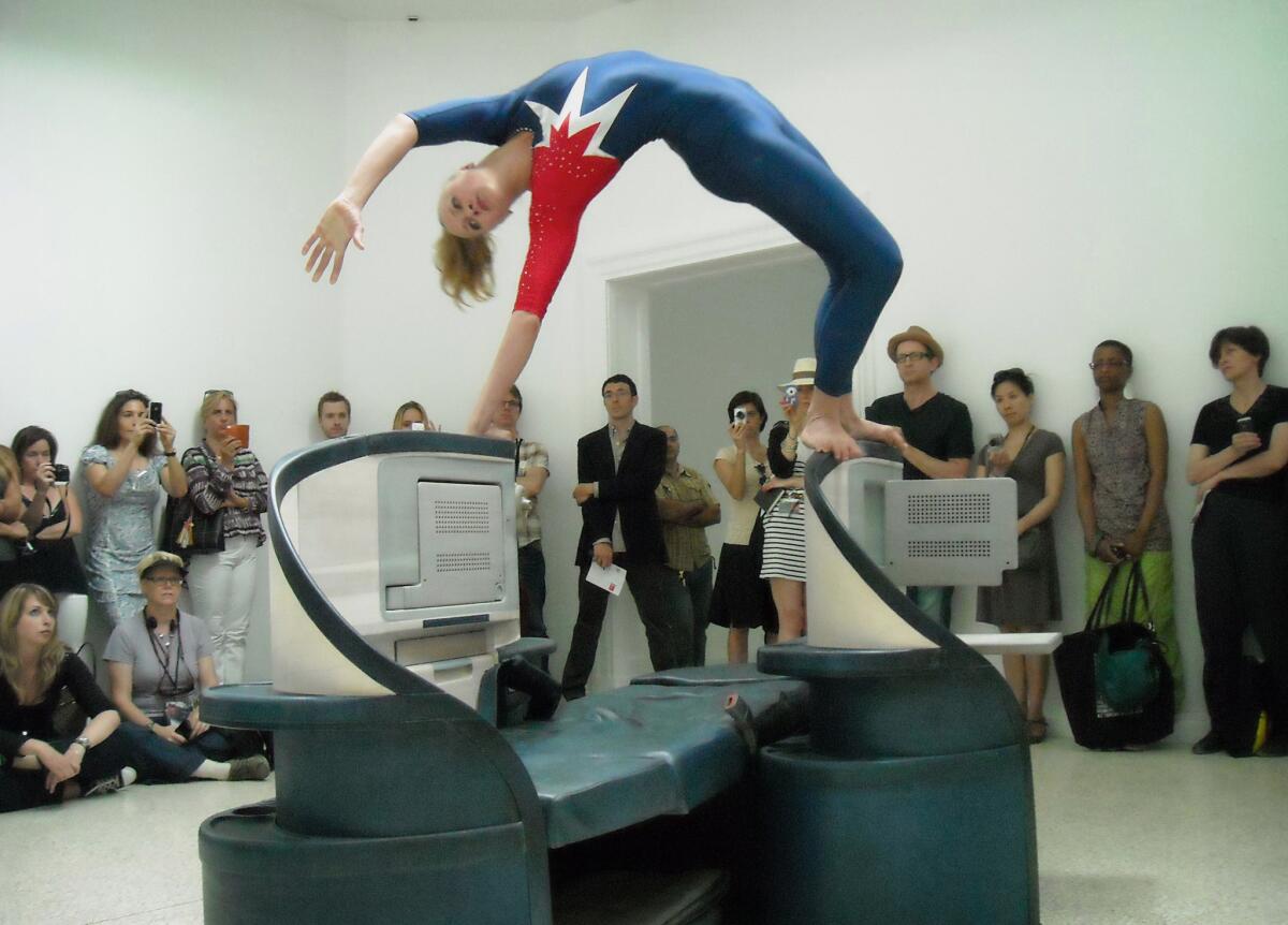 Gymnast and dancer Sadie Wilhelmi performs as part of Allora & Calzadilla's work "Gloria" at the Venice Biennale in 2011. Such events have one critic asking if art can be defined by nationality.
