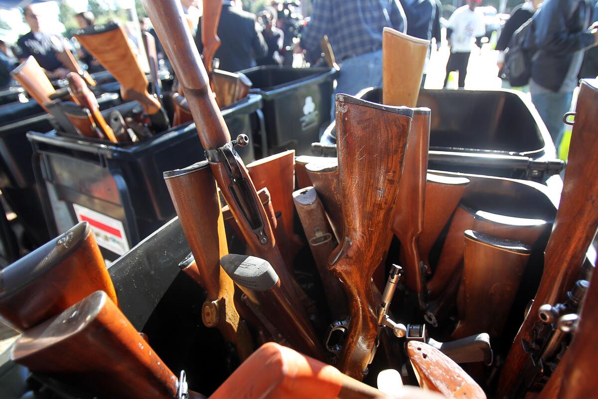 Hundreds of people in cars waited for hours to exchange their guns for monetary gift cards in December 2012 at the Los Angeles Memorial Sports Area. Hundreds of rifles, shotguns, handguns and assault weapons were sold to the Los Angeles Police Department in what has become an annual event.