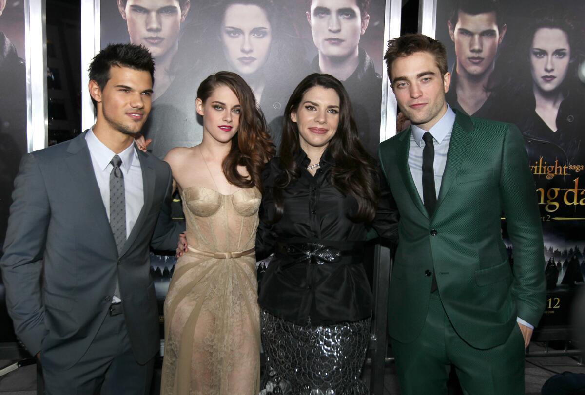 Taylor Lautner, Kristen Stewart, author Stephenie Meyer and Robert Pattinson at a "Twilight" premiere.