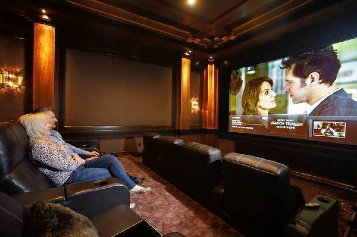 Looking for something to do with your Powerball millions? How about a home theater set-up where you can screen first-run movies?