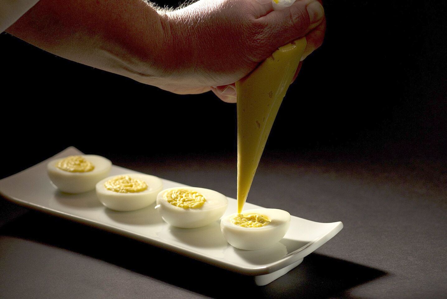 To show off the quality of expensive caviar, serve it atop deviled eggs. Recipe: Deviled eggs with caviar