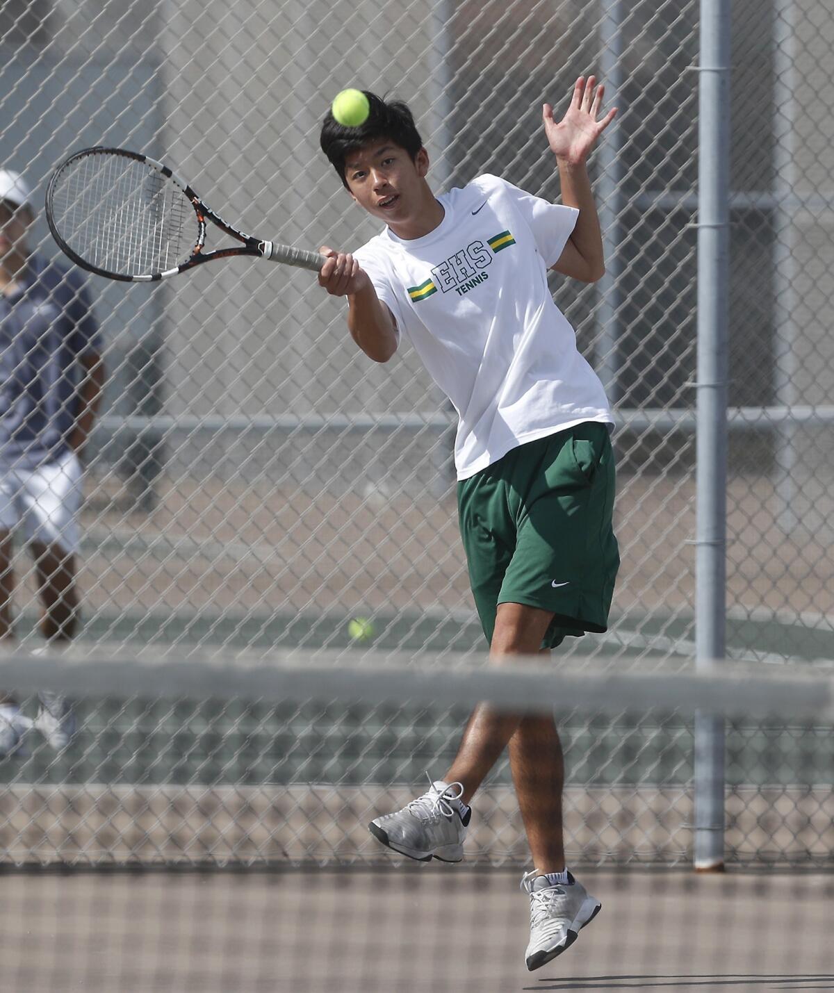 Edison High No. 1 doubles player Ryan Lum hits against Walnut in the quarterfinals of the CIF Southern Section Division 2 playoffs at home on Monday.
