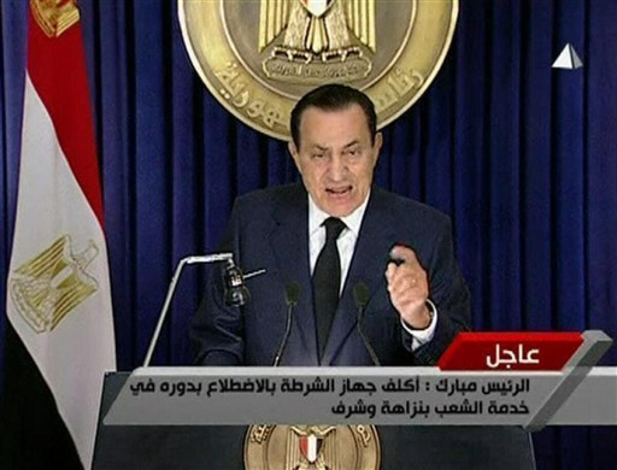 In this image from Egyptian state television aired Tuesday evening Feb. 1, 2011, Egyptian President Hosni Mubarak delivers an address announcing he will not run for a new term in office in September elections, but rejected demands that he step down immediately and leave the country, vowing to die on Egypt's soil. (AP Photo/Egyptian State Television via APTN) EGYPT OUT TV OUT