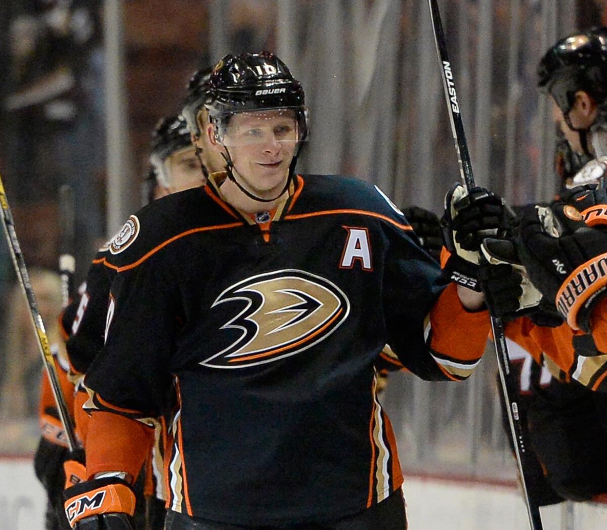Ducks forward Corey Perry celebrates a goal against the Nashville Predators with his teammates during the third period of a game Jan. 4 at Honda Center.