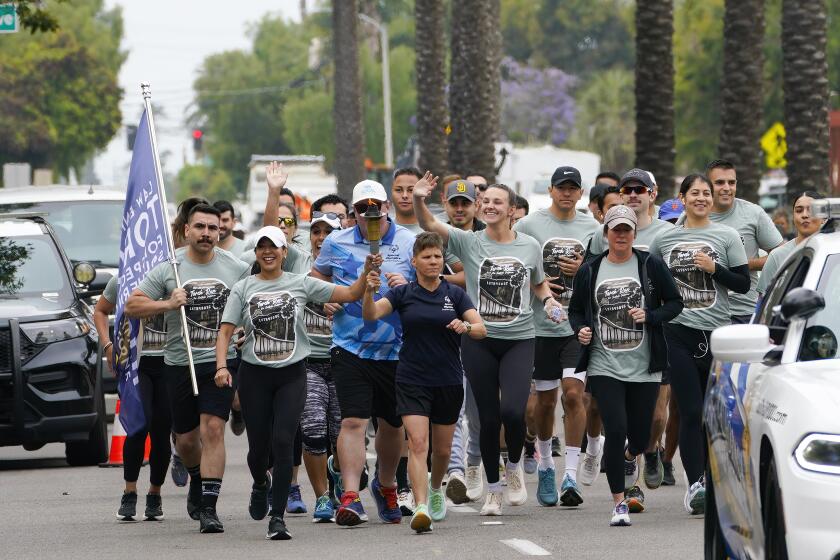 Chula Vista, CA - May 28: A handful of athletes along with supporters kicked off the 1,100-mile 2024 Law Enforcement Torch Run to benefit Special Olympics Southern from the California Chula Vista Police Department on Tuesday, May 28, 2024, in Chula Vista, CA. (Nelvin C. Cepeda / The San Diego Union-Tribune)