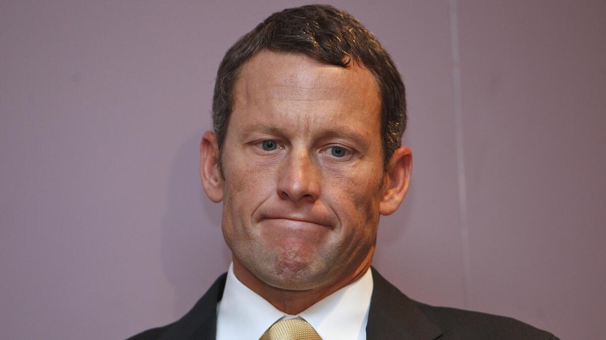 Lance Armstrong reportedly met with the head of the U.S. Anti-Doping Agency last week. Above, Armstrong at a news conference in Los Angeles in 2011.