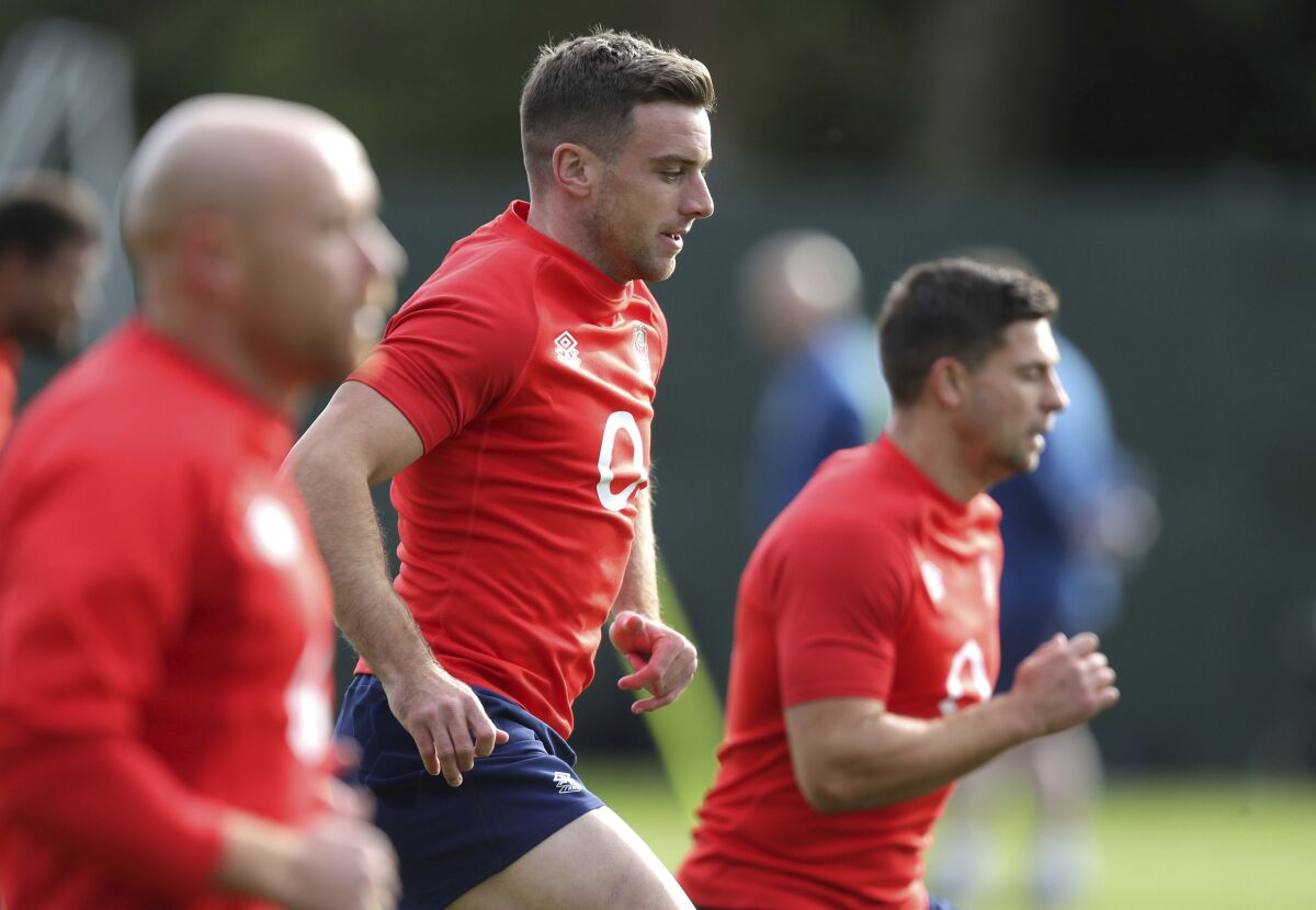 England's George Ford, center, attends a training session at The Lensbury, London, Wednesday Oct. 7, 2020. (Andrew Matthews/Pool via AP)