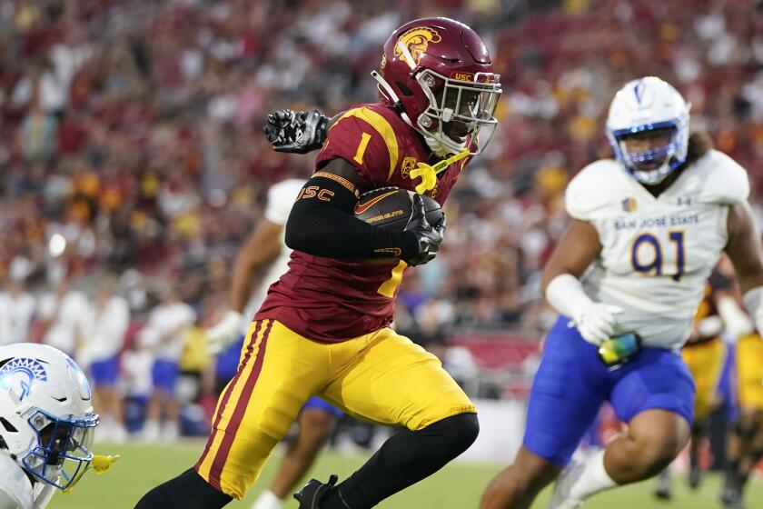Southern California wide receiver Zachariah Branch (1) runs toward the end zone.