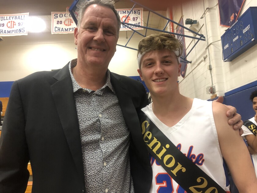 Former Simi Valley, UCLA and NBA standout Don MacLean with son, Kyle, a senior at Westlake, during senior night. 